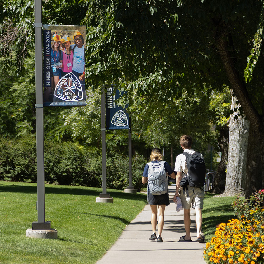 Students walking to class on   of Mines Campus