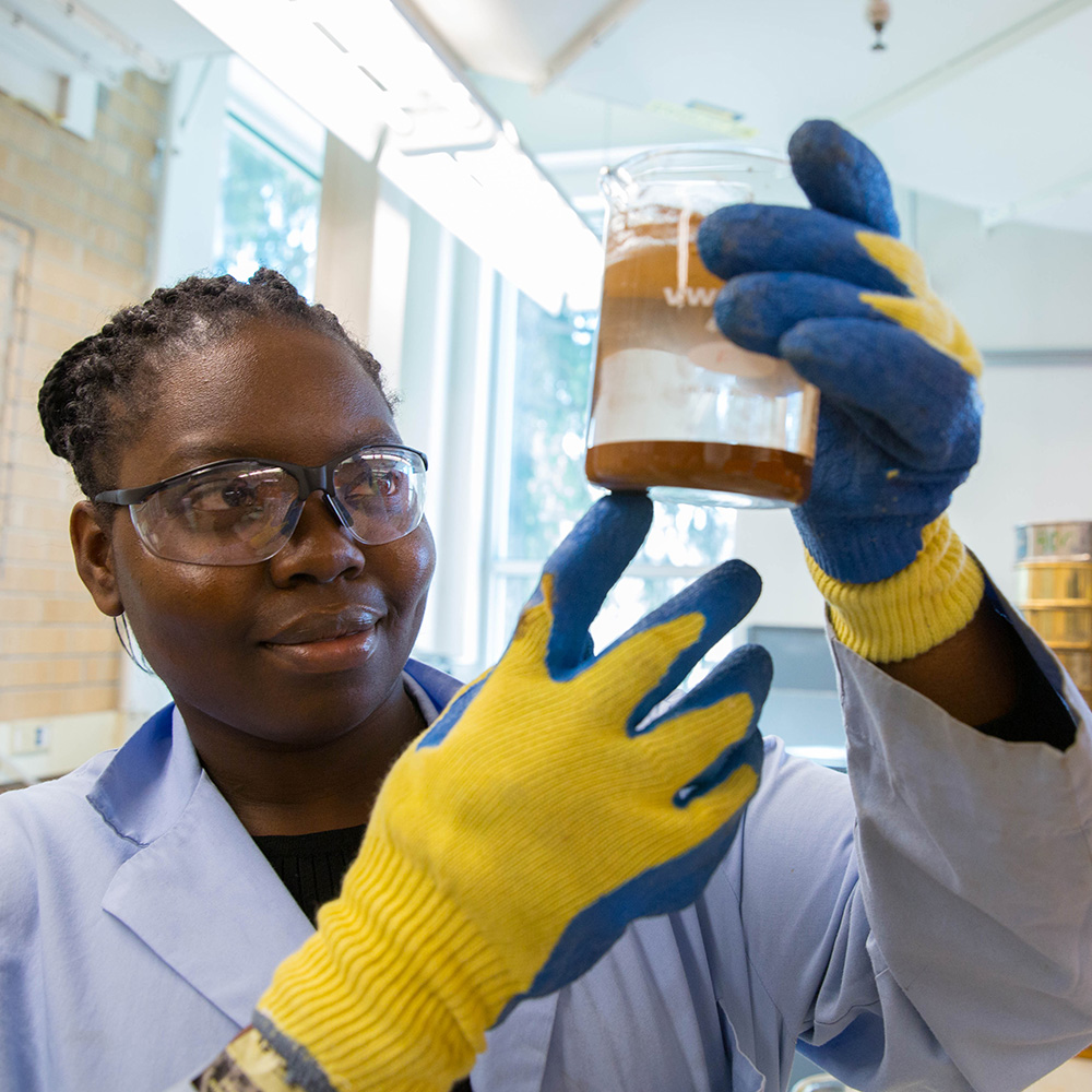 Mines graduate student working in a research lab